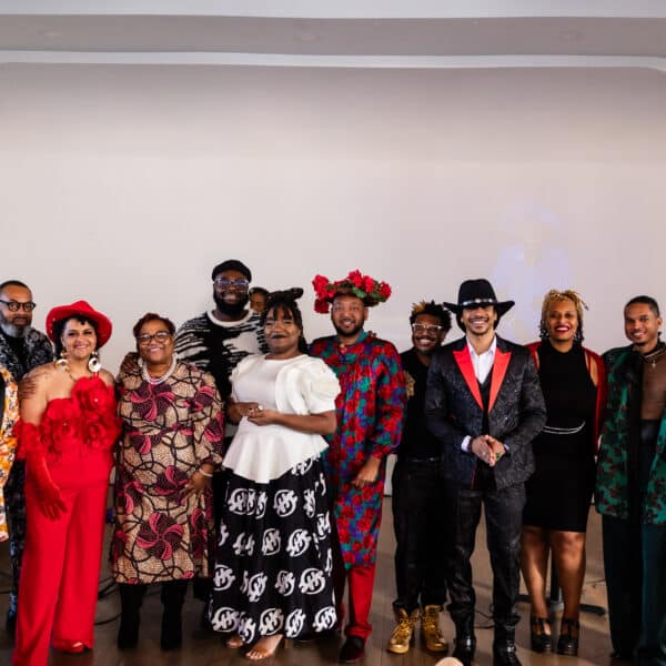 photo from a mashup group brunch event, 12 people dressed up with the theme of "roses of resilience"