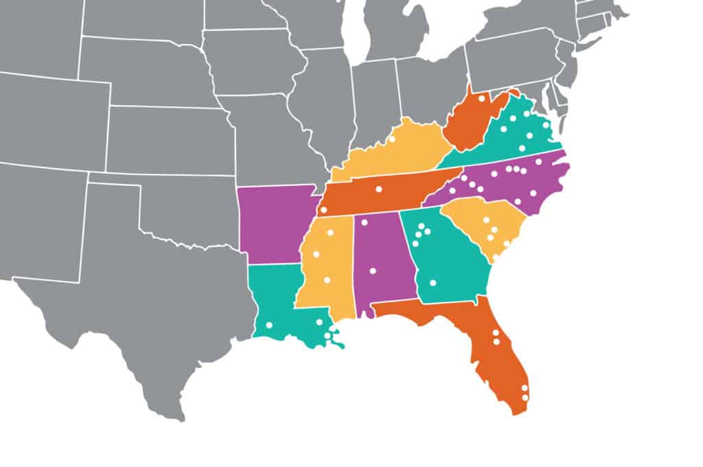map of US Southeast with Southern states colored in a variety of vibrant colors - orange, yellow, purple, teal - and white dots acros the region showing where LGF grantees are located
